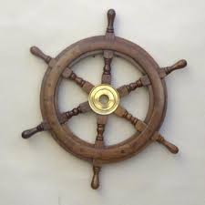 http://tbn2.google.com/images?q=tbn:6DlG7M1tahUIrM:http://www.robinsdocksideshop.com/Ships_wheel.jpg
