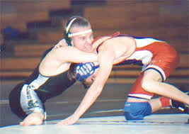 Kyle Maynard putting on one of his 