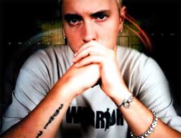 Eminem watches old videos to keep 