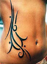 http://tbn2.google.com/images?q=tbn:vg5qzm6ill4tPM:http://i13.photobucket.com/albums/a270/x-xcellax-x/Tattoo20-20Tribal2027.jpg