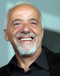 http://tbn2.google.com/images?q=tbn:F8iaK8ri-uy87M:http://scooterchronicles.com/wp-content/uploads/2009/02/paulo-coelho.jpg