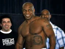  Mike Tyson, flashes a smile 